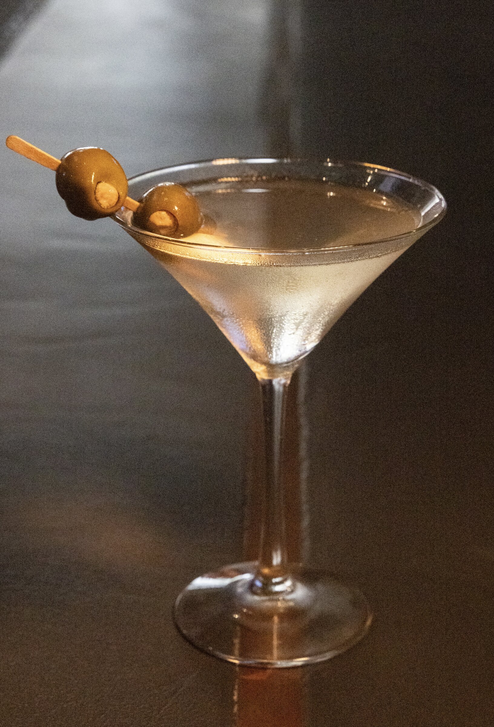Classic martini with olive garnish